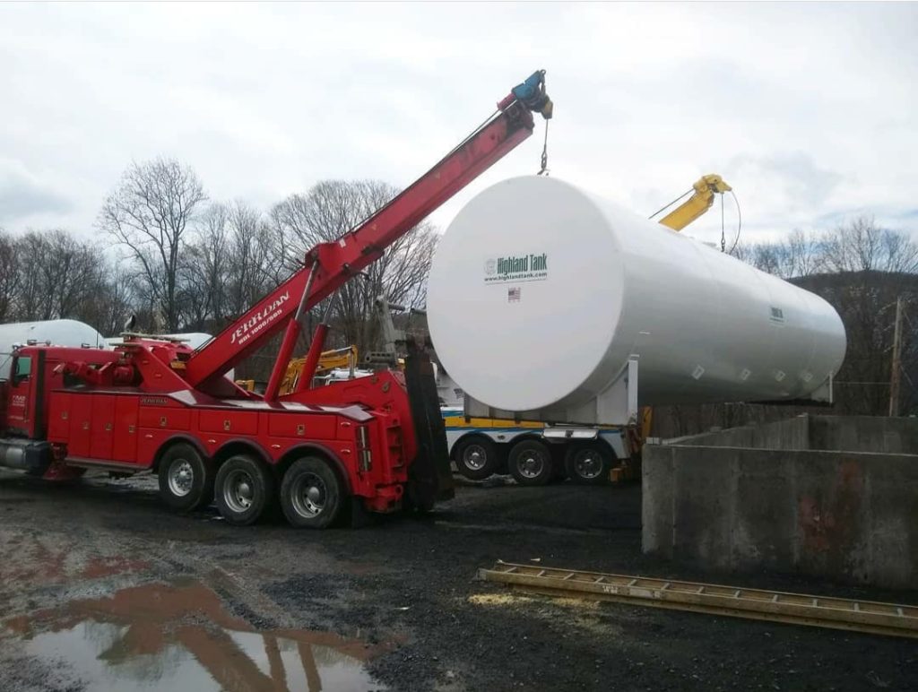 tank being hauled in by crane