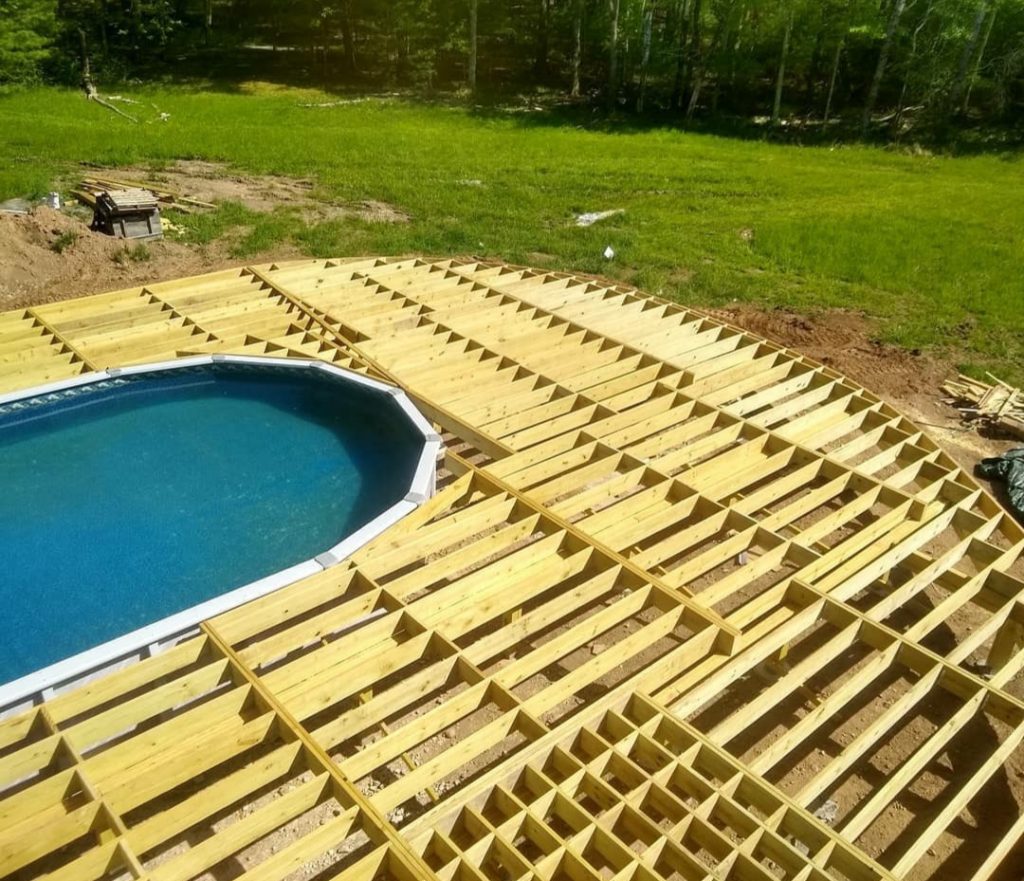 Wooden framing around pool