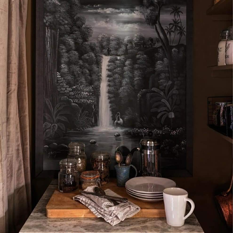 view of teacups and detailed wallpaper